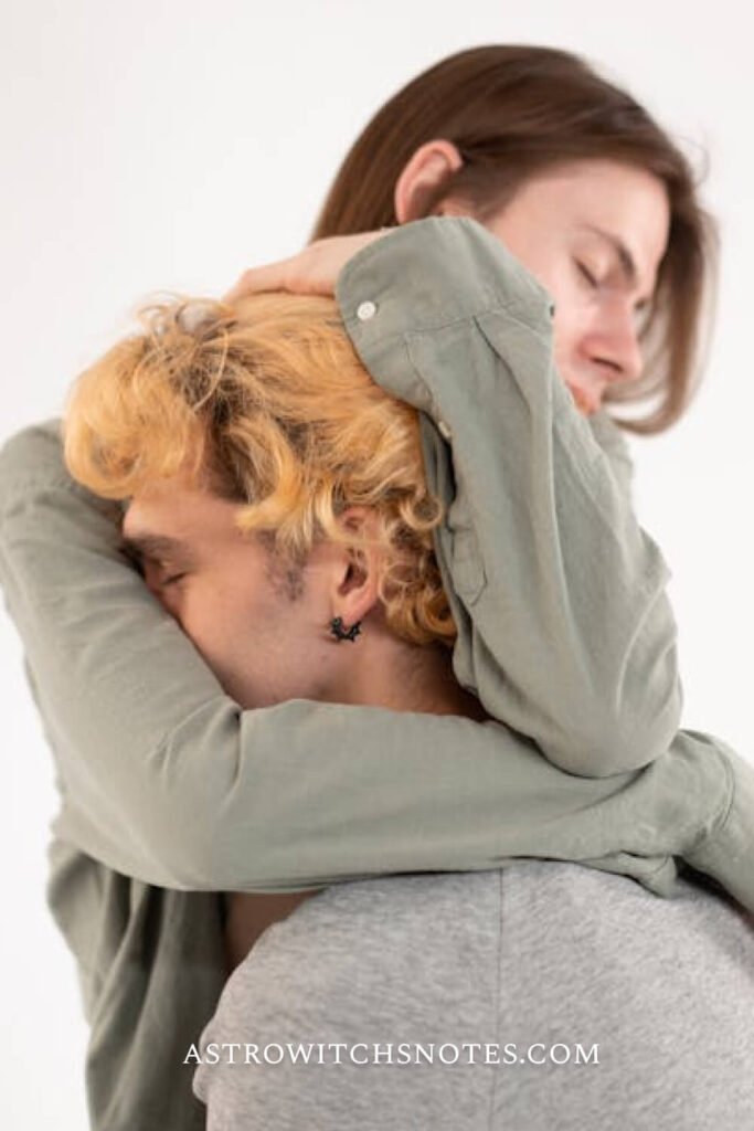 A couple is hugging each other so represent the physical touch of the 5 love languages.